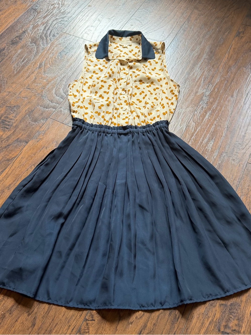 Women Sleeveless Yellow Printed Top with Navy Pleated Skirt Dress
